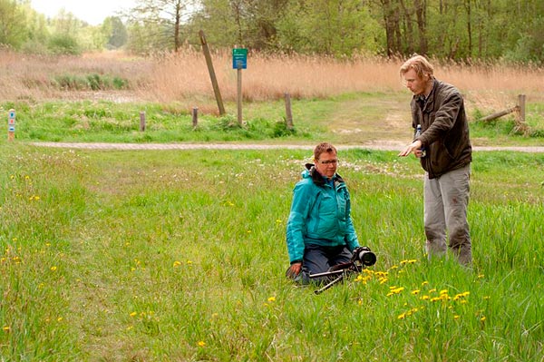 Instructie in het veld over de te kiezen scherptediepte en compositie